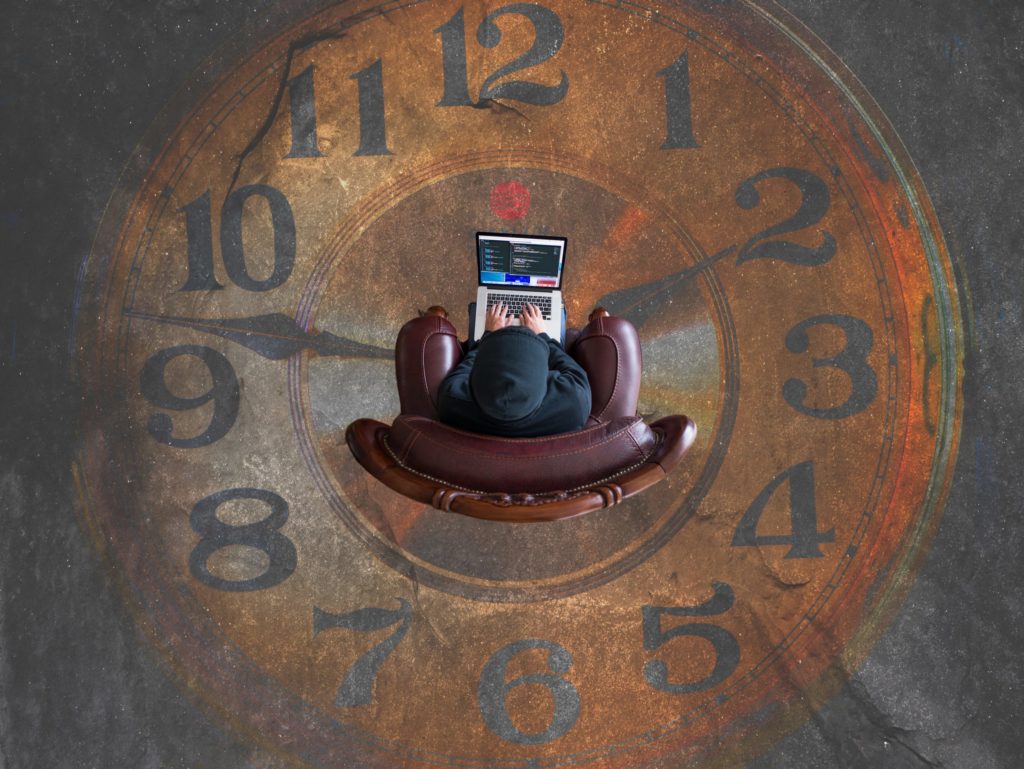 clock with person in a couch